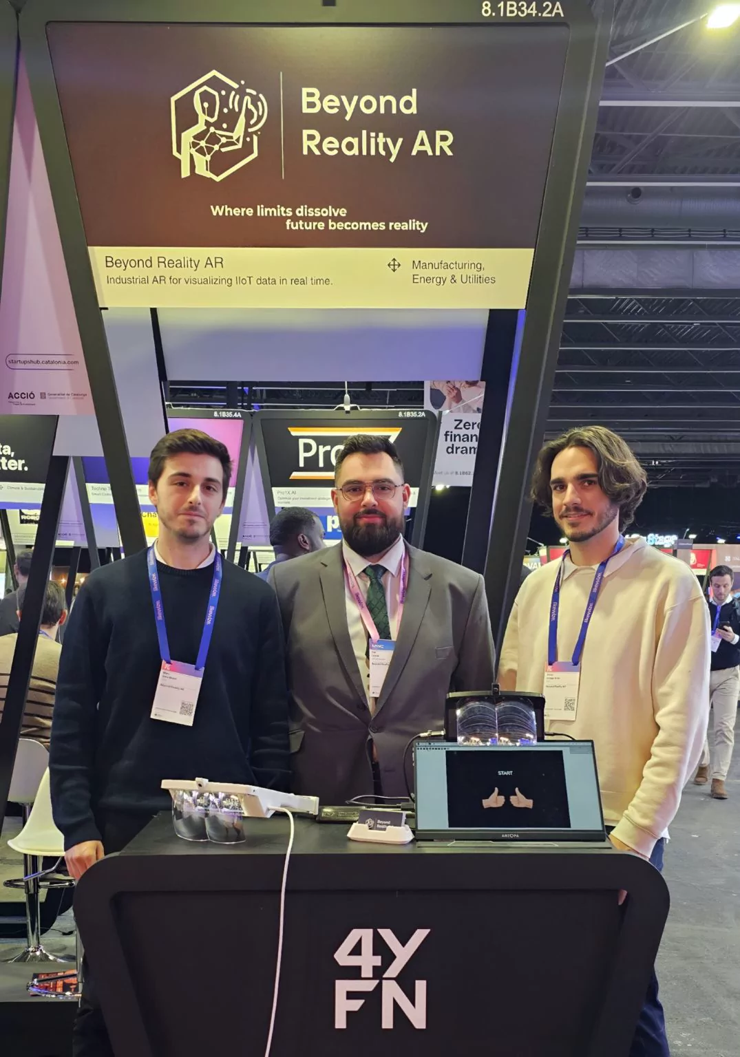 The Beyond Reality AR stand at MWC 2026 with visitors trying ARD1.