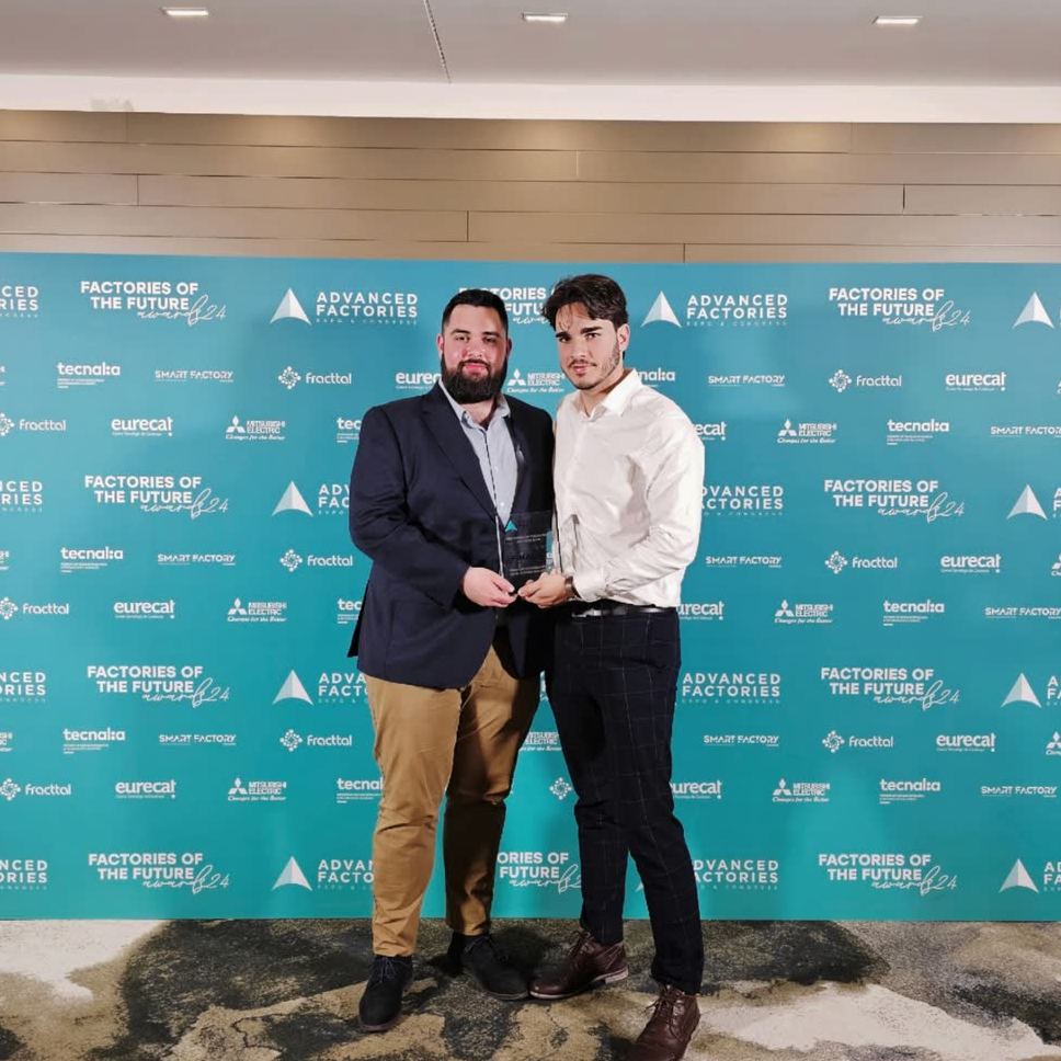The Beyond Reality AR team holding the Factories of the Future Awards finalist trophy.